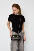 Bolso princesa con acento de oro en C