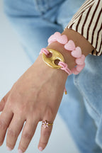 Pulsera de cordón de satén con detalle de botón