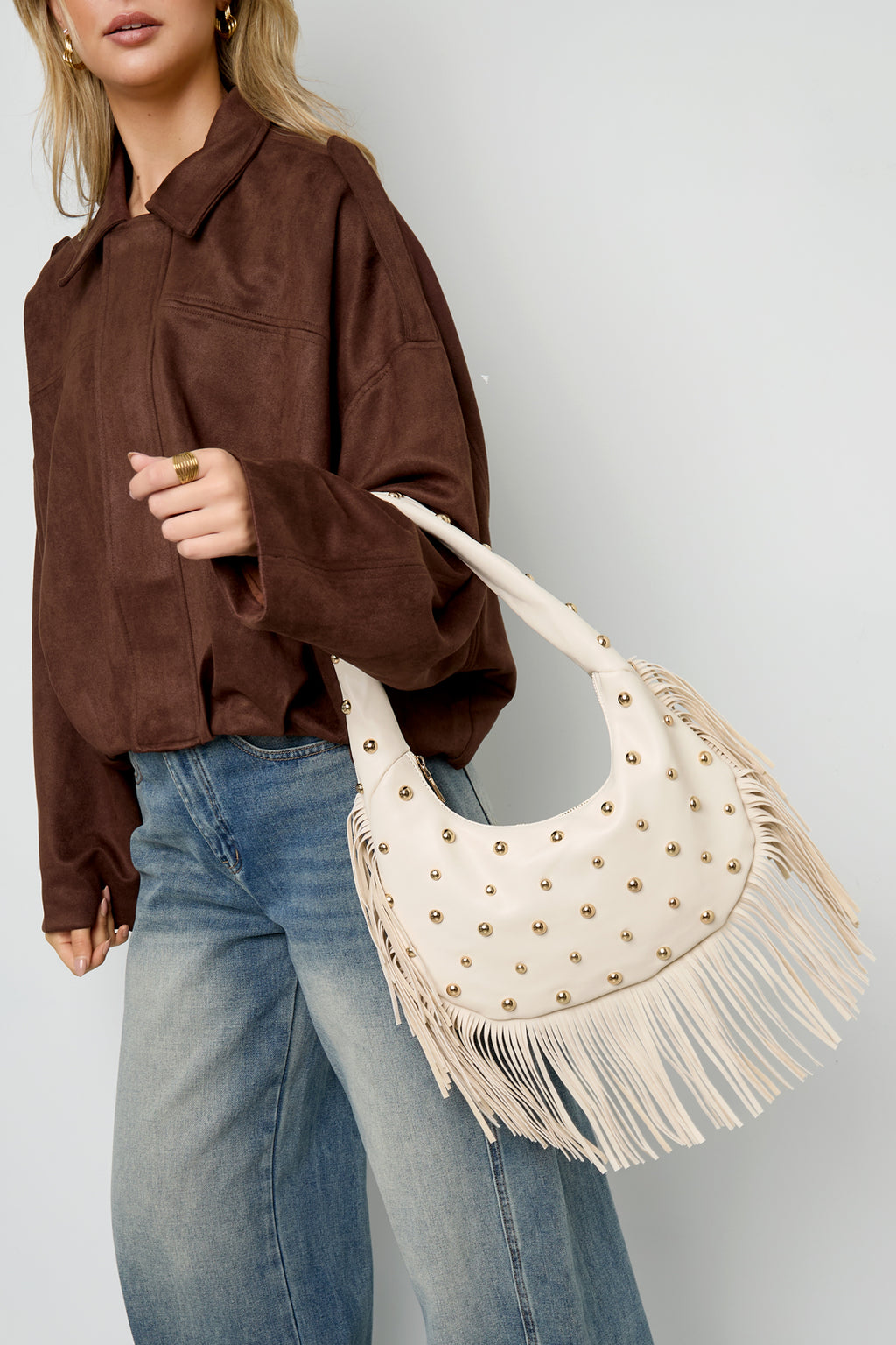 Bolso de mano con tachuelas