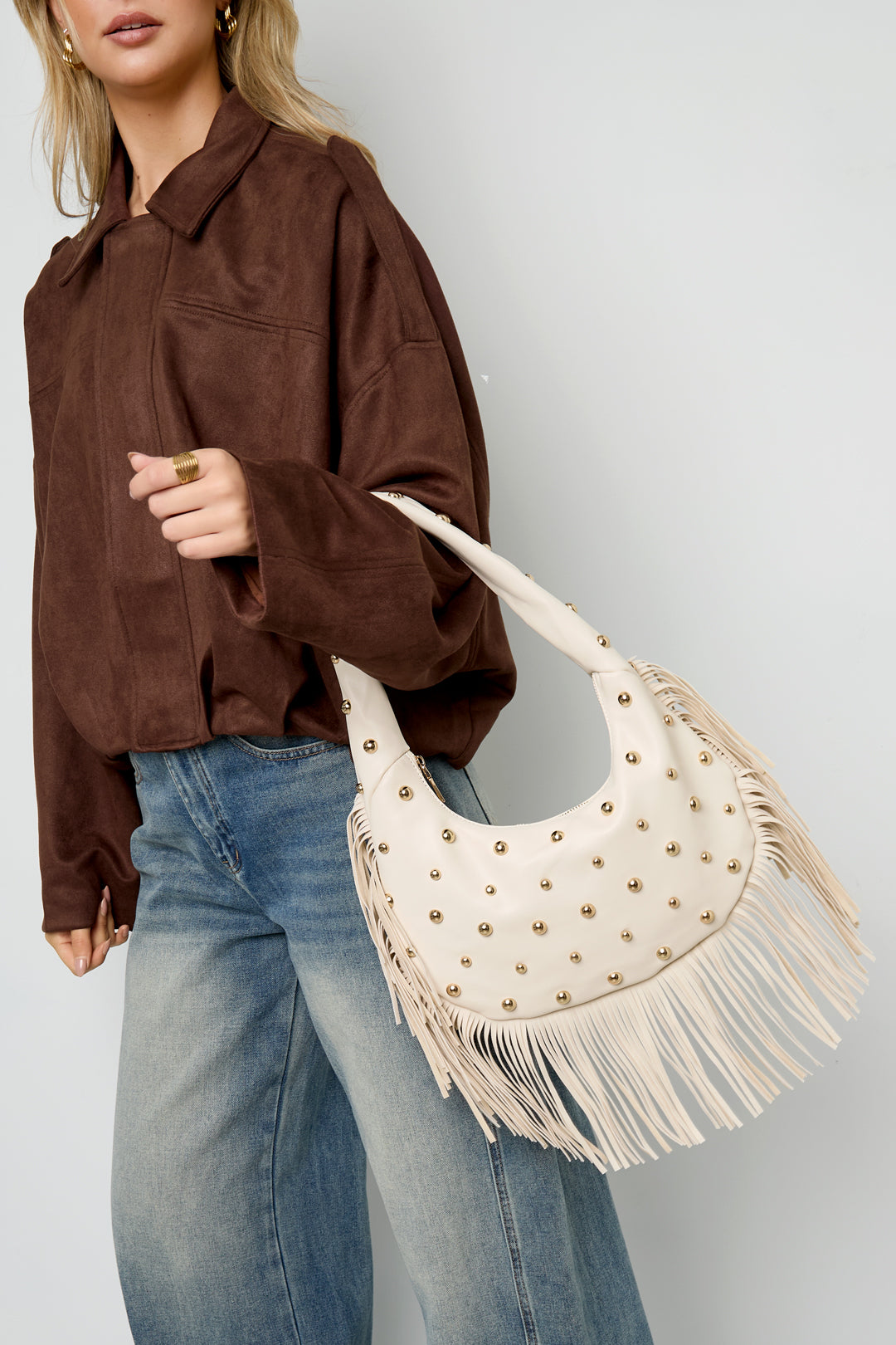 Bolso de mano con tachuelas
