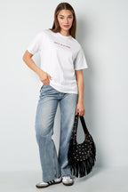 Bolso de mano con tachuelas