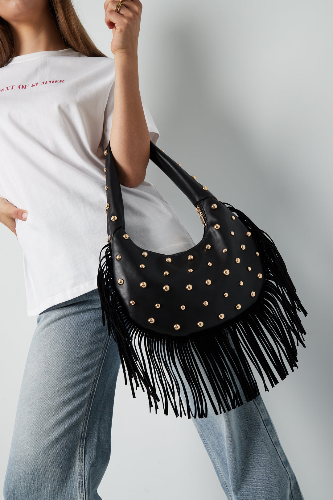 Bolso de mano con tachuelas